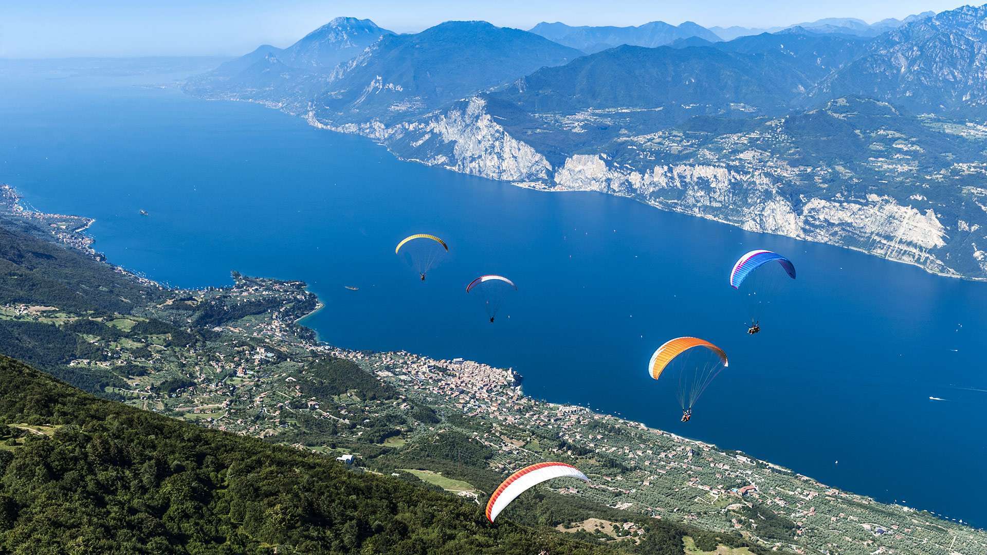 Paragliding from Monte Baldo, Malcesine, with Lake Garda view