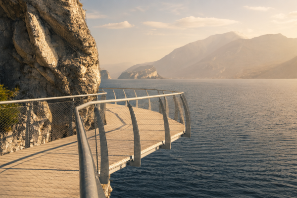 Limone–Riva cycle and pedestrian path at sunset with suspended walkway on the rock, Wind tunnel