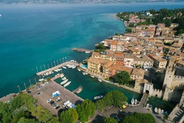 Aerial view of Sirmione harbour on Lake Garda with the Scaligero Castle